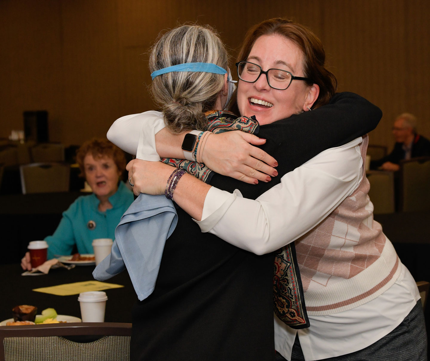 Two women hugging